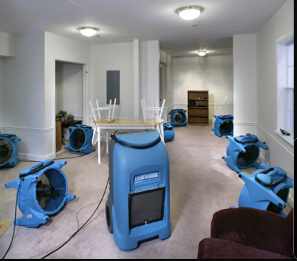 Air movers and dehumidifier setup for Water Extraction & Removal in Calhoun
